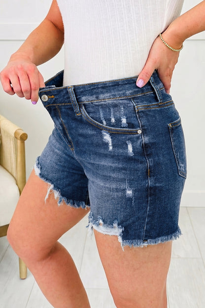 Beau Blue Asymmetric Raw Hem Distressed Whiskery Denim Shorts